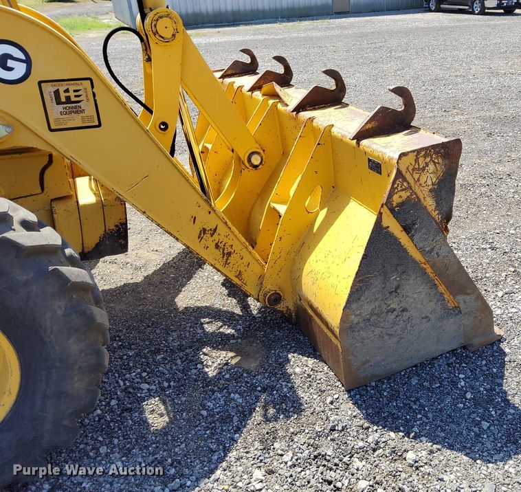 image for item KW9023 2004 John Deere 310SG  backhoe