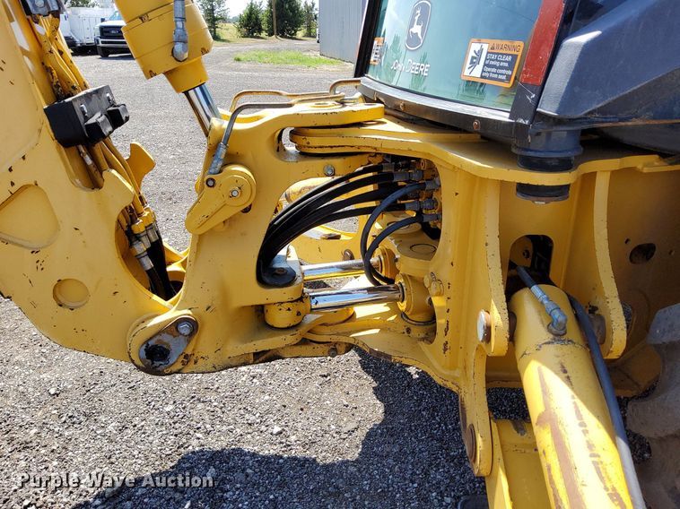 image for item KW9023 2004 John Deere 310SG  backhoe