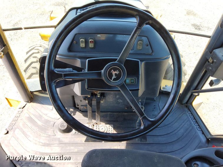 image for item KW9023 2004 John Deere 310SG  backhoe