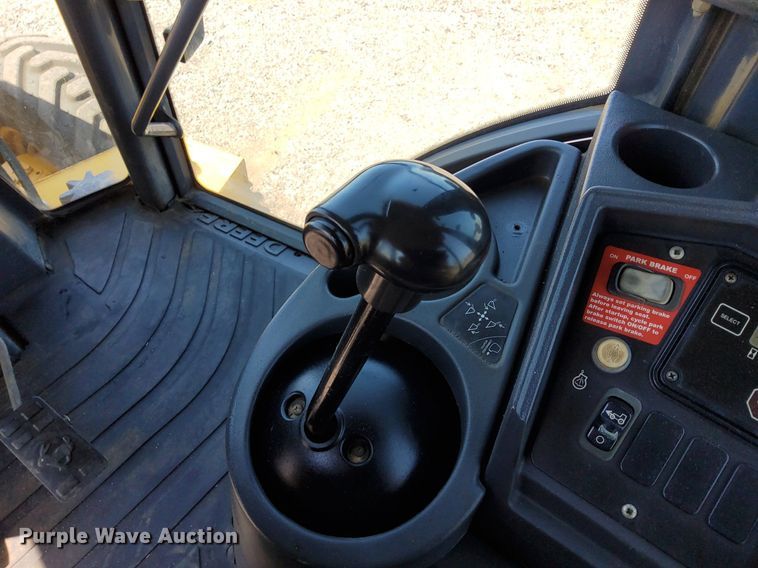 image for item KW9023 2004 John Deere 310SG  backhoe