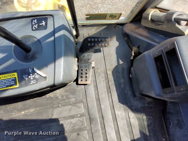 image for item KW9023 2004 John Deere 310SG  backhoe