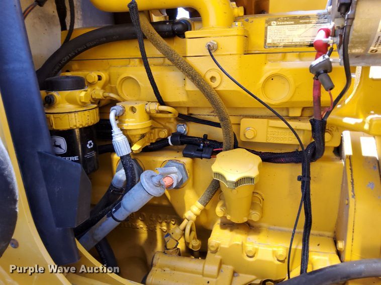 image for item KW9023 2004 John Deere 310SG  backhoe