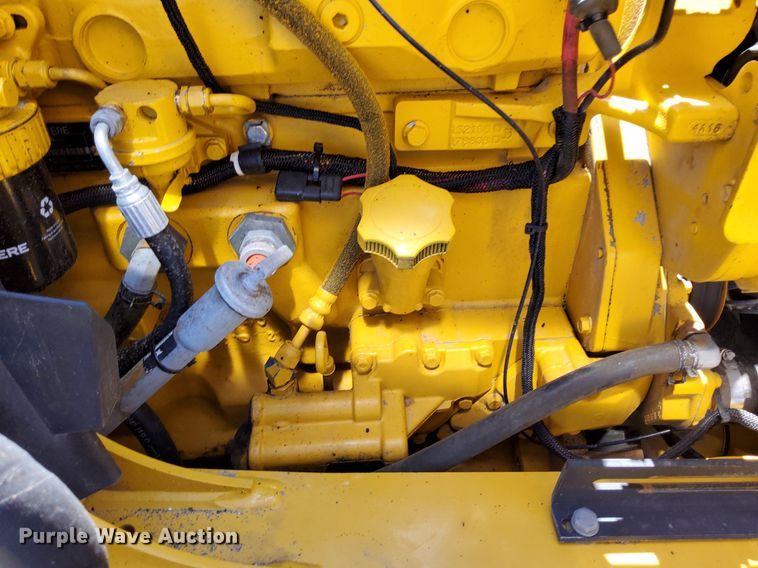 image for item KW9023 2004 John Deere 310SG  backhoe