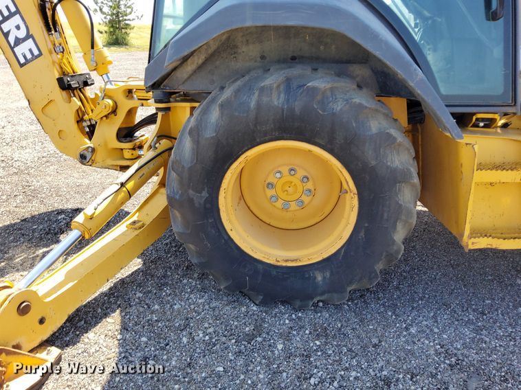 image for item KW9023 2004 John Deere 310SG  backhoe