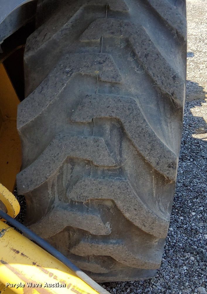 image for item KW9023 2004 John Deere 310SG  backhoe