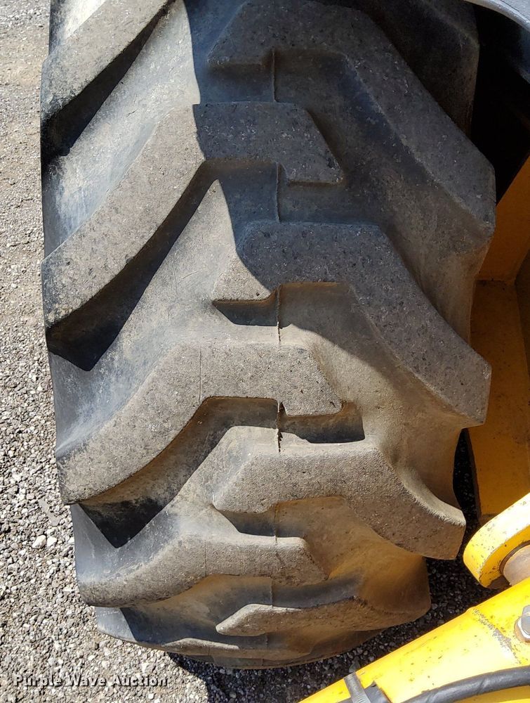 image for item KW9023 2004 John Deere 310SG  backhoe