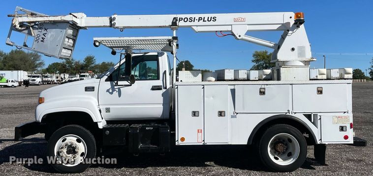 image for item LV9105 1999 GMC C7  bucket truck