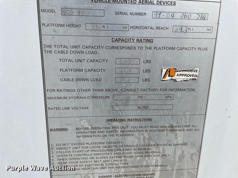 image for item LV9105 1999 GMC C7  bucket truck