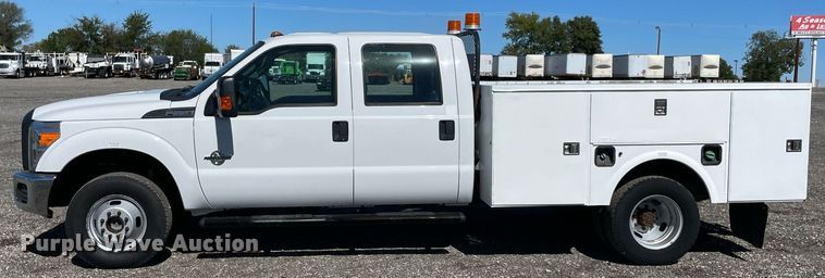 image for item LV9108 2014 Ford F350  Crew Cab utility bed pickup truck