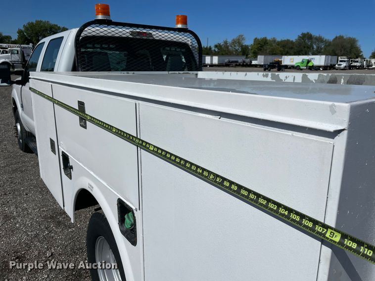 image for item LV9108 2014 Ford F350  Crew Cab utility bed pickup truck