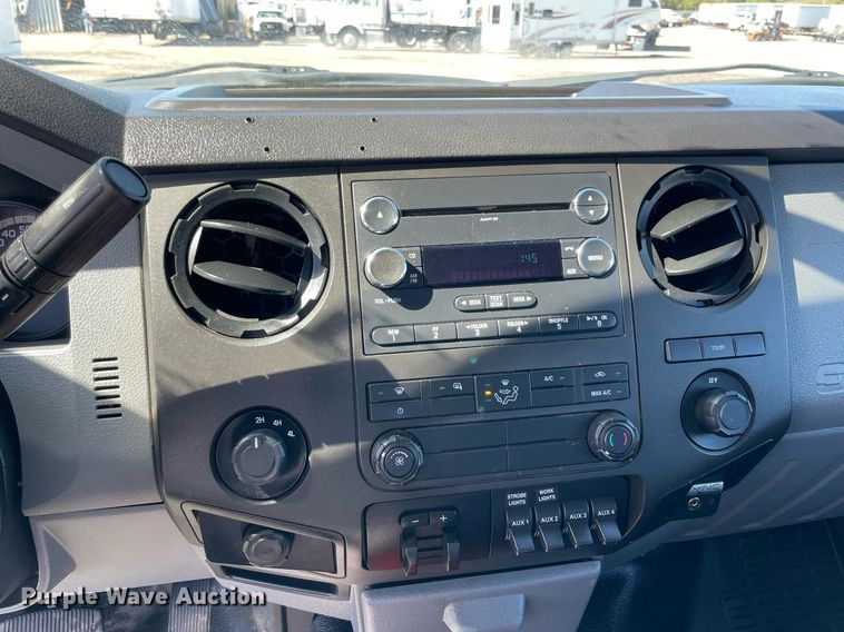 image for item LV9108 2014 Ford F350  Crew Cab utility bed pickup truck