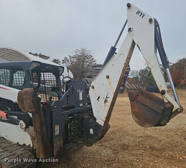 image for item NP9060 Bobcat 811  skid steer backhoe