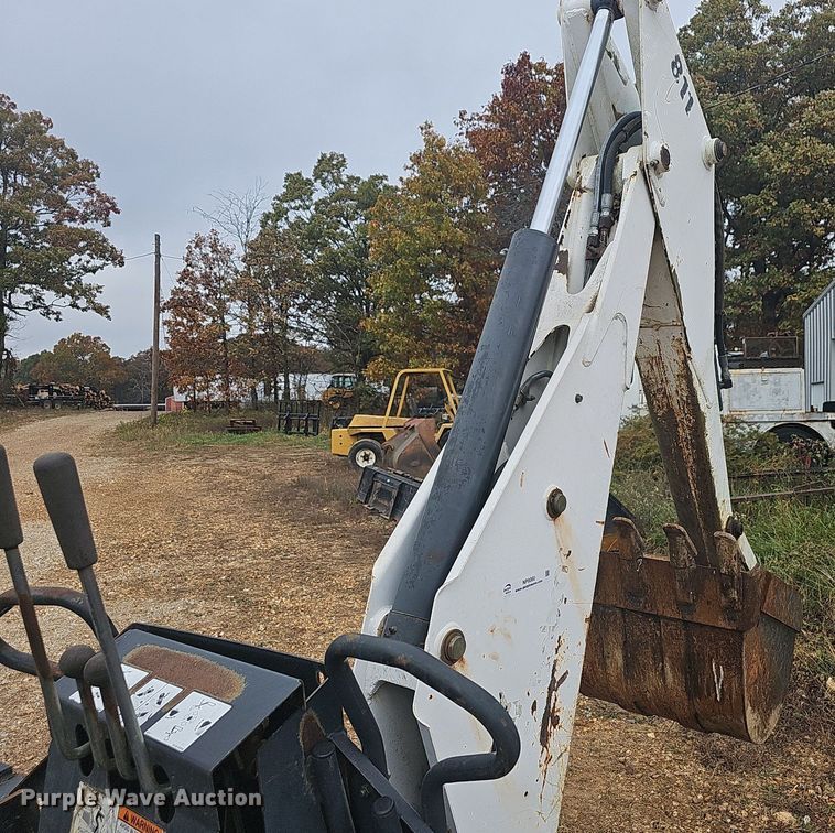 image for item NP9060 Bobcat 811  skid steer backhoe