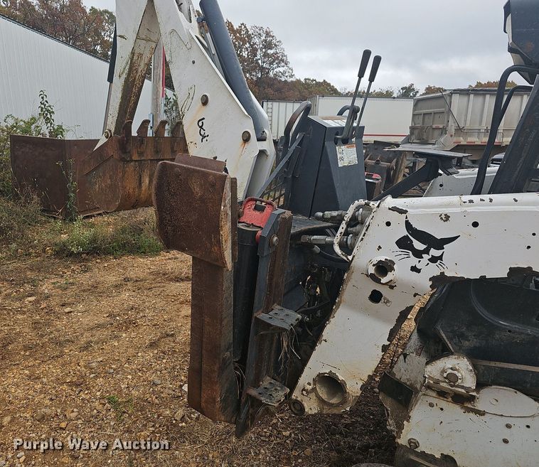 image for item NP9060 Bobcat 811  skid steer backhoe
