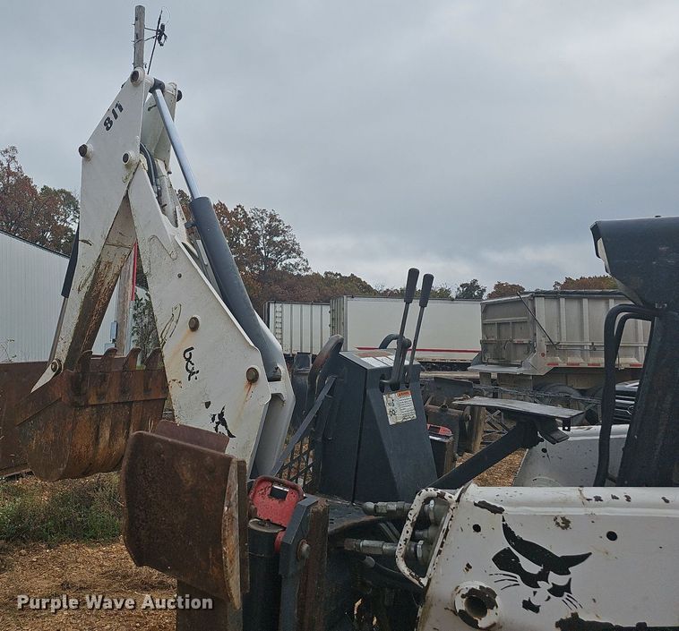 image for item NP9060 Bobcat 811  skid steer backhoe