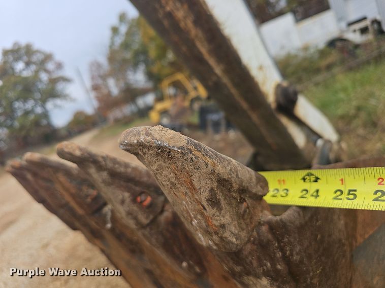 image for item NP9060 Bobcat 811  skid steer backhoe