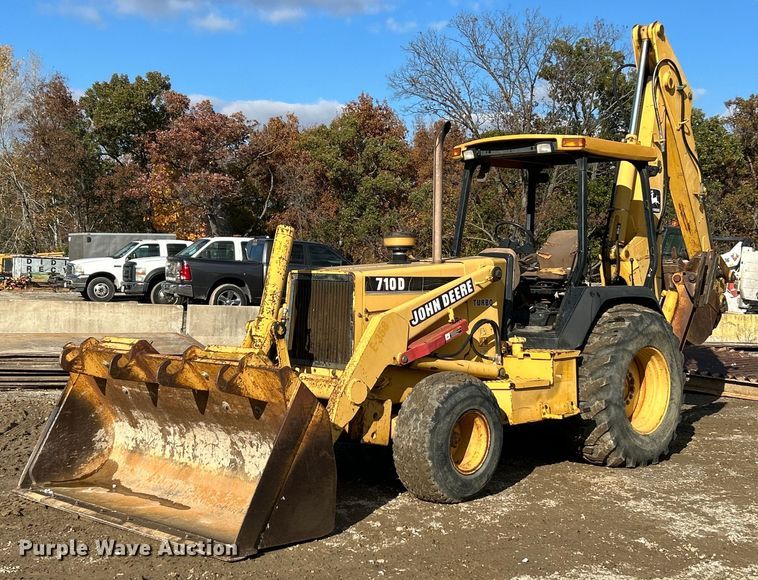 image for item NR9317 1997 John Deere 710D  backhoe