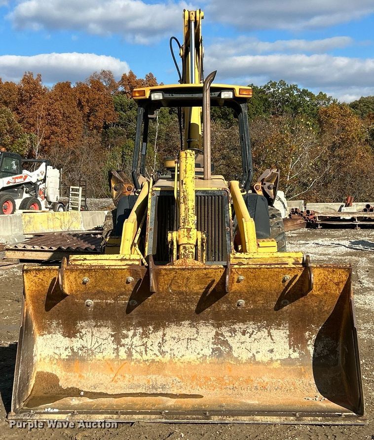 image for item NR9317 1997 John Deere 710D  backhoe