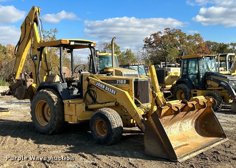 image for item NR9317 1997 John Deere 710D  backhoe
