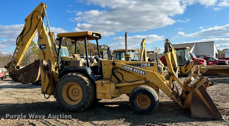 image for item NR9317 1997 John Deere 710D  backhoe