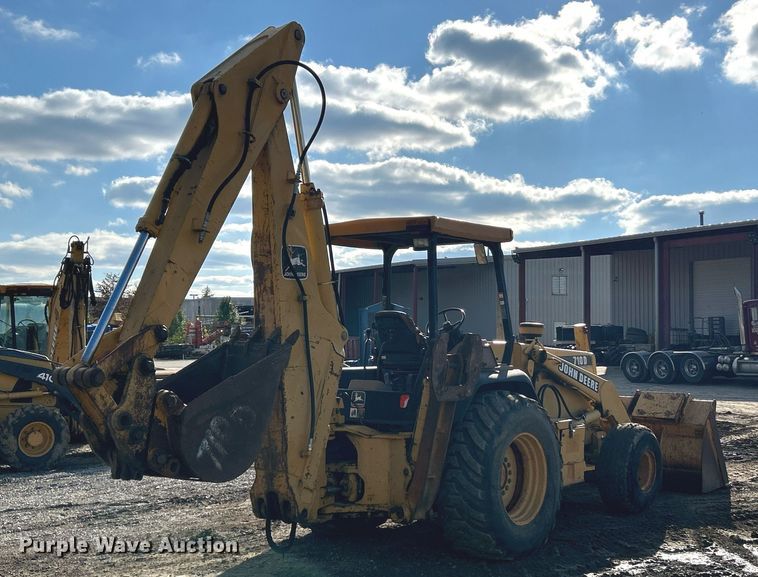 image for item NR9317 1997 John Deere 710D  backhoe