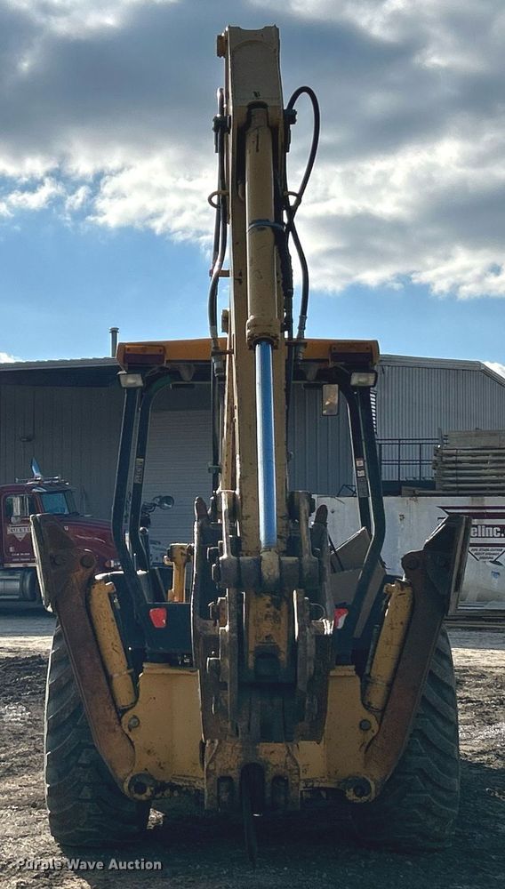 image for item NR9317 1997 John Deere 710D  backhoe