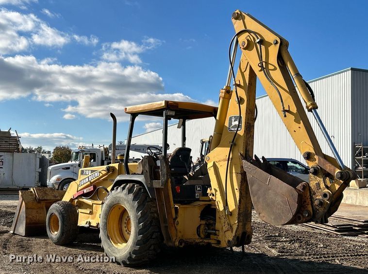 image for item NR9317 1997 John Deere 710D  backhoe
