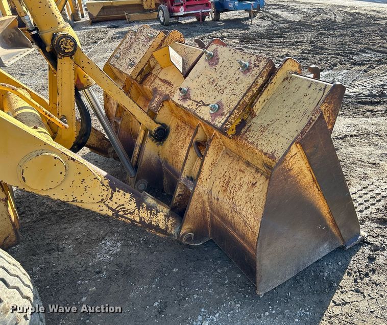 image for item NR9317 1997 John Deere 710D  backhoe