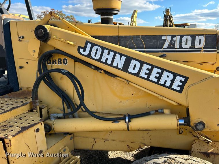 image for item NR9317 1997 John Deere 710D  backhoe