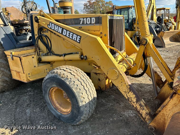 image for item NR9317 1997 John Deere 710D  backhoe