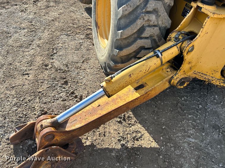 image for item NR9317 1997 John Deere 710D  backhoe