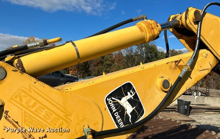 image for item NR9317 1997 John Deere 710D  backhoe