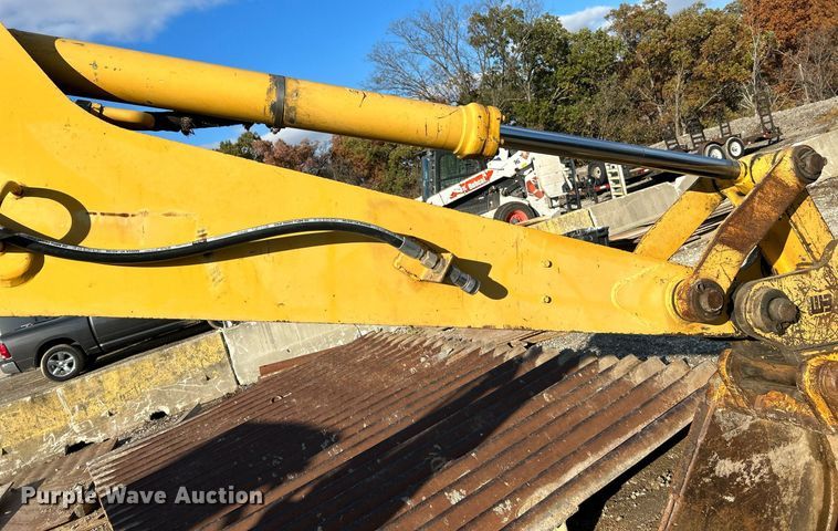 image for item NR9317 1997 John Deere 710D  backhoe