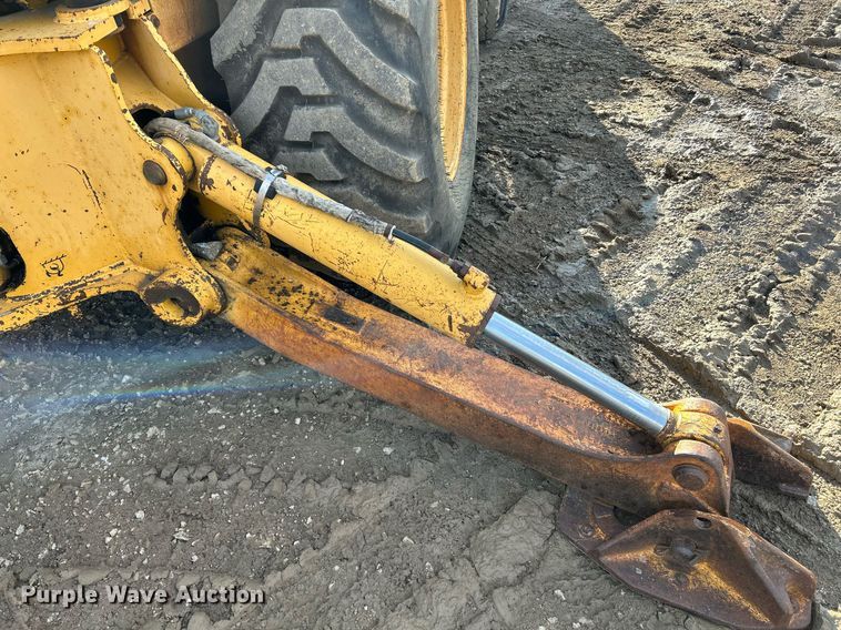 image for item NR9317 1997 John Deere 710D  backhoe