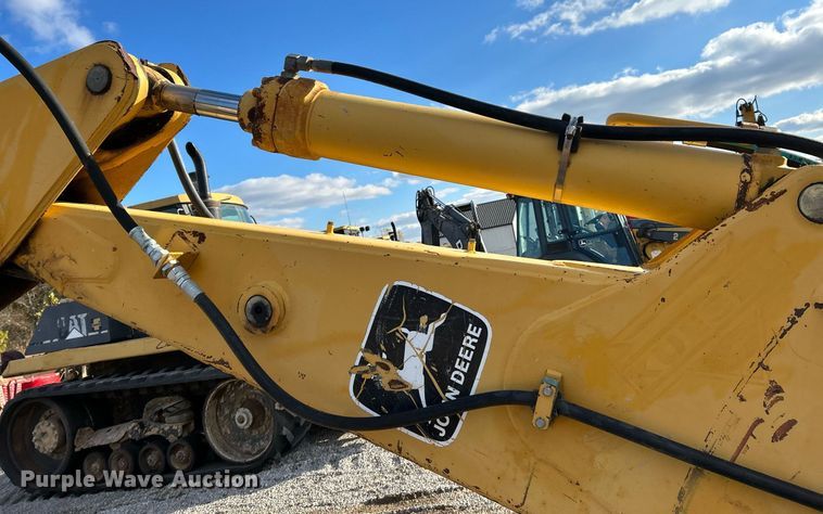 image for item NR9317 1997 John Deere 710D  backhoe