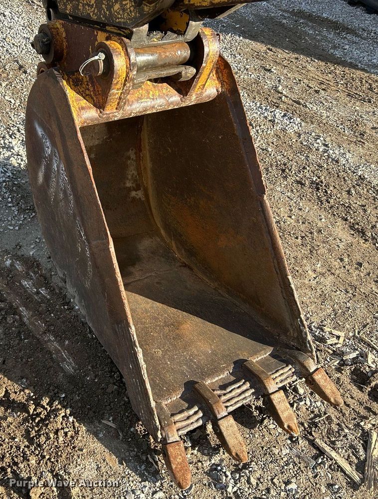 image for item NR9317 1997 John Deere 710D  backhoe