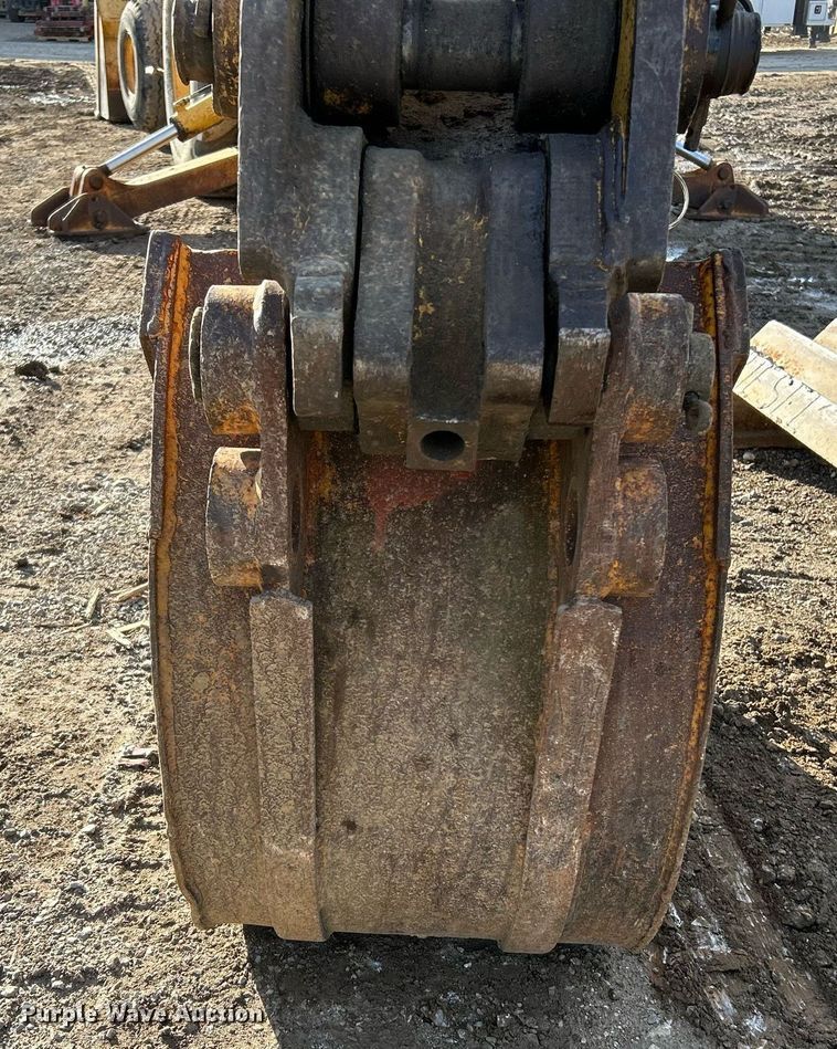 image for item NR9317 1997 John Deere 710D  backhoe