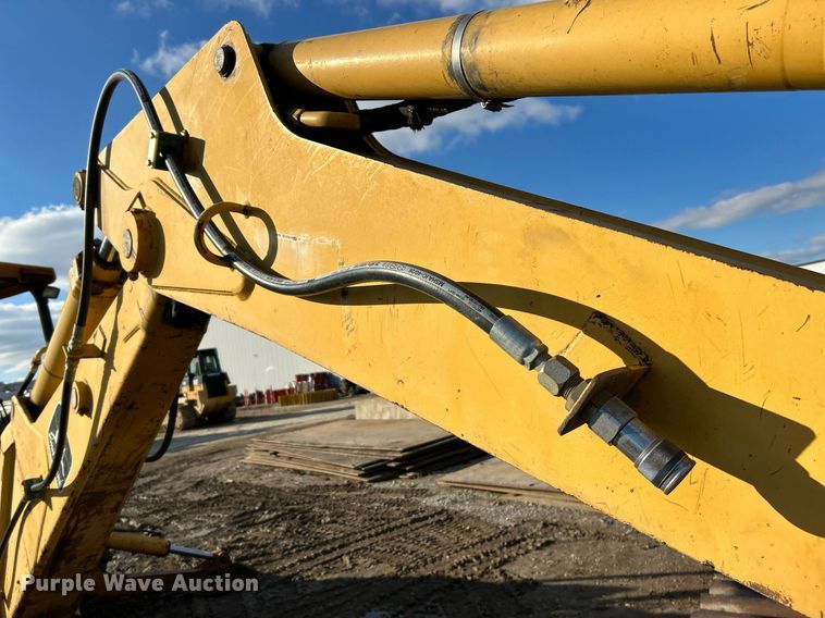 image for item NR9317 1997 John Deere 710D  backhoe