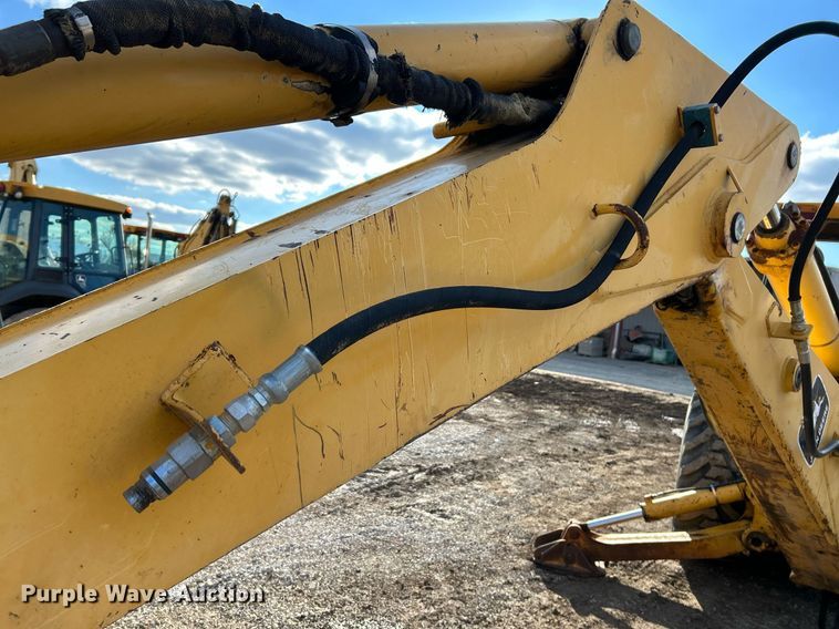 image for item NR9317 1997 John Deere 710D  backhoe