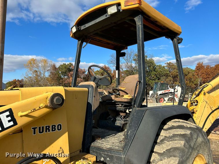 image for item NR9317 1997 John Deere 710D  backhoe