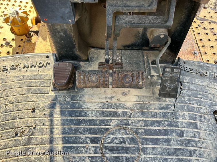 image for item NR9317 1997 John Deere 710D  backhoe