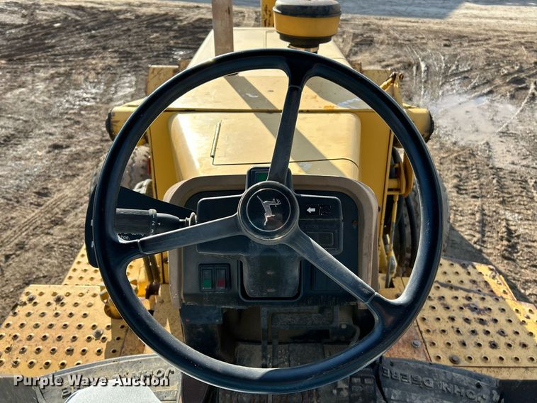 image for item NR9317 1997 John Deere 710D  backhoe