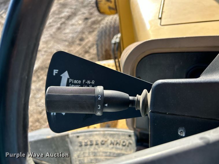 image for item NR9317 1997 John Deere 710D  backhoe