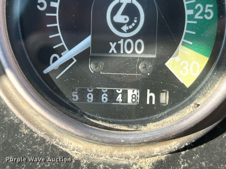 image for item NR9317 1997 John Deere 710D  backhoe