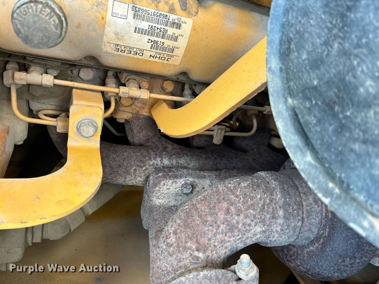 image for item NR9317 1997 John Deere 710D  backhoe