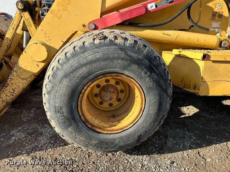 image for item NR9317 1997 John Deere 710D  backhoe