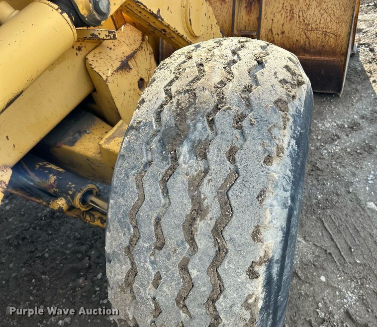 image for item NR9317 1997 John Deere 710D  backhoe