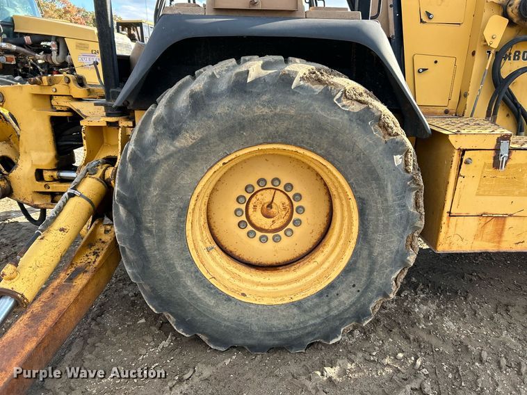 image for item NR9317 1997 John Deere 710D  backhoe