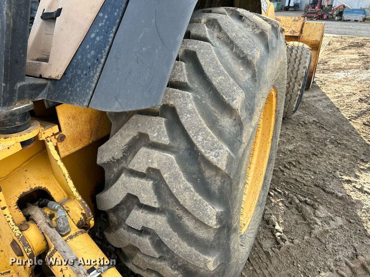 image for item NR9317 1997 John Deere 710D  backhoe