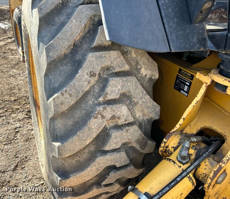 image for item NR9317 1997 John Deere 710D  backhoe